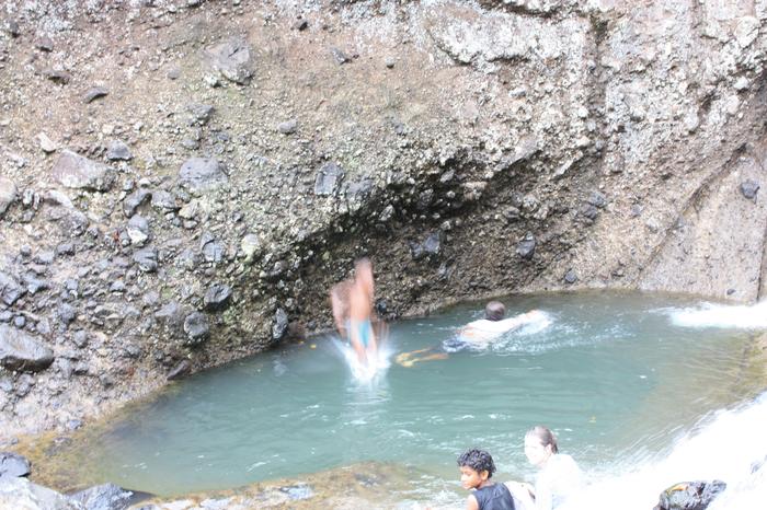 Kids jumping in the pool