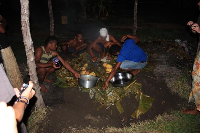 Opening the earth oven